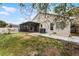 Home features a screened porch, patio, and fenced backyard at 1621 Riveredge Rd, Oviedo, FL 32766