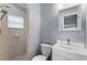 Clean bathroom with shower, toilet and white vanity at 1621 Riveredge Rd, Oviedo, FL 32766