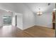 Dining area with chandelier and access to the kitchen at 1621 Riveredge Rd, Oviedo, FL 32766