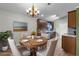 Kitchen and dining area with hardwood floors at 1621 Riveredge Rd, Oviedo, FL 32766