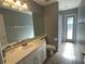 Clean bathroom with single vanity and shower/tub at 1901 Griff Wood Ct, Saint Cloud, FL 34772