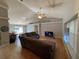 Living area with sectional sofa and high ceilings at 1901 Griff Wood Ct, Saint Cloud, FL 34772