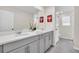 Bathroom with double vanity and access to toilet at 1919 Tropical Palms Cir, Kissimmee, FL 34747