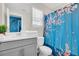 Bathroom with shower and tub at 1919 Tropical Palms Cir, Kissimmee, FL 34747