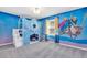 bedroom with Frozen mural and bunk beds at 1919 Tropical Palms Cir, Kissimmee, FL 34747