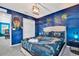 Harry Potter-themed bedroom with mural and comfortable bed at 1919 Tropical Palms Cir, Kissimmee, FL 34747