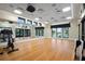 Fitness room with cardio equipment and large windows at 1919 Tropical Palms Cir, Kissimmee, FL 34747