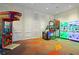 Game room featuring various arcade games for entertainment at 1919 Tropical Palms Cir, Kissimmee, FL 34747