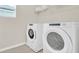 Laundry room with washer and dryer at 1919 Tropical Palms Cir, Kissimmee, FL 34747