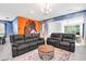 Relaxing living room with Star Wars mural and sectional at 1919 Tropical Palms Cir, Kissimmee, FL 34747