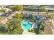 Community pool and surrounding buildings from above at 200 Maitland Ave # 37, Altamonte Springs, FL 32701