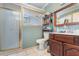 Clean bathroom with a shower/tub combo and wood vanity at 23627 Franklin Ave, Sorrento, FL 32776