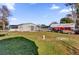 Aerial view showing home, yard, and shed at 28 Da Rosa Ave, Debary, FL 32713