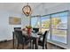 Bright dining area with table, chairs, and large windows at 28 Da Rosa Ave, Debary, FL 32713