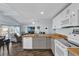 Modern kitchen with butcher block countertops and island at 28 Da Rosa Ave, Debary, FL 32713