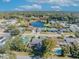 Aerial view of a house near a lake with a pool in the backyard at 3306 Florene Dr, Orlando, FL 32806