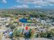 Aerial view of a single-Gathering home in a residential neighborhood near a lake at 3306 Florene Dr, Orlando, FL 32806