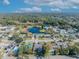 Aerial view of a single-Gathering home near a lake and residential neighborhood at 3306 Florene Dr, Orlando, FL 32806