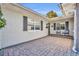 Inviting front patio with brick pavers and comfortable seating at 3306 Florene Dr, Orlando, FL 32806