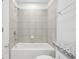 Bathroom with tiled shower and bathtub at 3326 Thicket St, Tavares, FL 32778