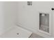 Laundry room with a built-in ice maker and drain at 3326 Thicket St, Tavares, FL 32778