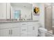 Primary bathroom with double vanity and walk-in shower at 3328 Thicket St, Tavares, FL 32778