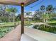 Scenic view of a lake from a gazebo, showcasing the property's beauty at 3415 S Mellonville Ave, Sanford, FL 32773