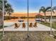 Enjoy sunset views from this lakeside patio with comfortable seating at 3415 S Mellonville Ave, Sanford, FL 32773