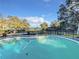 Inviting pool with a fenced backyard and scenic water view at 3415 S Mellonville Ave, Sanford, FL 32773