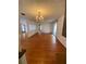 Bright dining room featuring hardwood floors and chandelier at 3430 N Westmoreland Dr, Orlando, FL 32804