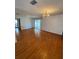 Bright dining room with hardwood floors and a chandelier at 3430 N Westmoreland Dr, Orlando, FL 32804