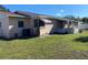 Side view of the house showing additional lawn space and AC unit at 3430 N Westmoreland Dr, Orlando, FL 32804