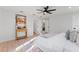 Spacious bedroom with a queen-size bed and light wood flooring at 417 Main Trl, Ormond Beach, FL 32174