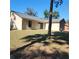 Back exterior view of house showing sliding glass door at 510 N Leavitt Ave, Orange City, FL 32763