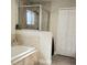 Bathroom features a shower and bathtub at 510 N Leavitt Ave, Orange City, FL 32763