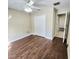 Spacious bedroom with double doors closet and wood-look floors at 510 N Leavitt Ave, Orange City, FL 32763