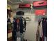 Large walk-in closet with shelving and hanging rods at 510 N Leavitt Ave, Orange City, FL 32763