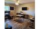 Home office with a desk, two monitors, and wood flooring at 510 N Leavitt Ave, Orange City, FL 32763