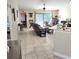 Living room with tile floors and sliding glass doors at 510 N Leavitt Ave, Orange City, FL 32763