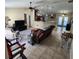 Living room with open floor plan and kitchen view at 510 N Leavitt Ave, Orange City, FL 32763