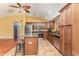 Modern kitchen featuring stainless steel appliances and granite countertops at 5572 Myakka Ave, Intercession City, FL 33848