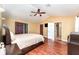 Large main bedroom with ensuite bath and access to backyard at 5572 Myakka Ave, Intercession City, FL 33848