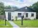 Charming bungalow with modern exterior and landscaping at 631 Callahan St, Winter Park, FL 32789