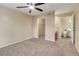 Spacious bedroom with large closet and ceiling fan at 7240 Westpointe Blvd # 1115, Orlando, FL 32835