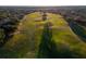 Aerial view of a lush green golf course at 7240 Westpointe Blvd # 1115, Orlando, FL 32835