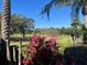 Picturesque view of a serene golf course from a residential property at 7240 Westpointe Blvd # 1115, Orlando, FL 32835