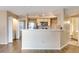 Modern kitchen with stainless steel appliances and light wood cabinets at 7240 Westpointe Blvd # 1115, Orlando, FL 32835