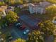 Aerial view of tennis court in apartment complex at 7240 Westpointe Blvd # 1115, Orlando, FL 32835