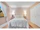 Light and airy bedroom with a comfortable bed and plenty of closet space at 743 Golden Sunshine Cir, Orlando, FL 32807