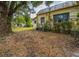 Side of house with large tree at 750 E Pearl St, Bartow, FL 33830